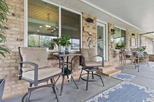 a view of a porch with a yard