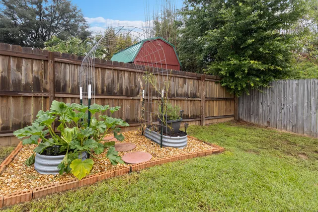 a house with swimming pool in front of it