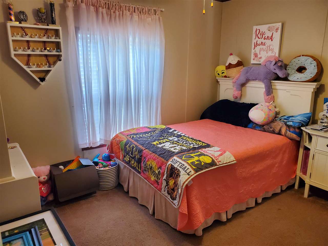 8251 Edith-Nankipoo Road Ripley, TN 38063 - Photo 11 of 17 a bedroom with a bed and dresser