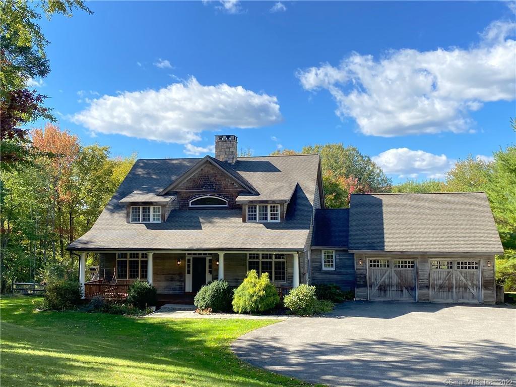 199 Baldwin Hill Road Washington, CT 06777 - Photo 1 of 1 Front view of home, large paved level driveway area and two car heated garage with side entrance and storage loft.