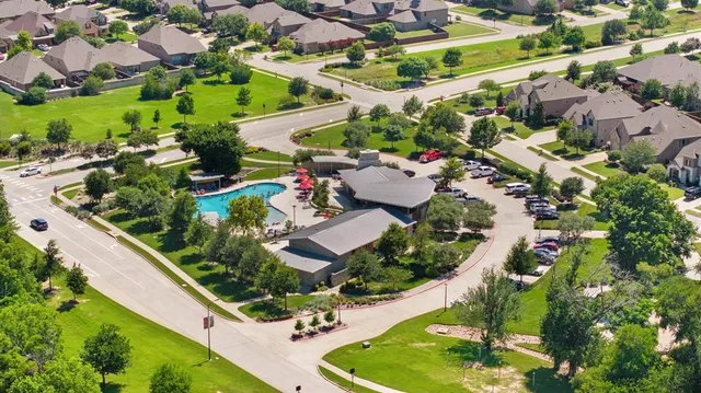 an aerial view of a house with a ocean view