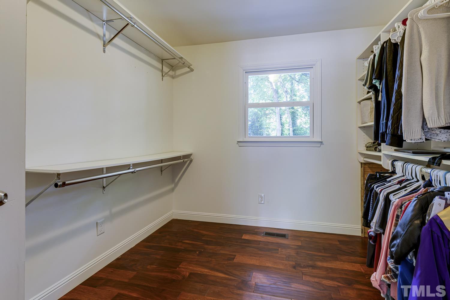 3516 Donna Road Raleigh, NC 27604 - Photo 19 of 41 a view of walk in closet with clothes and shoes