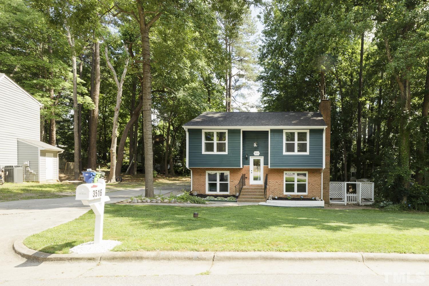 3516 Donna Road Raleigh, NC 27604 - Photo 2 of 41 front view of a house with a yard