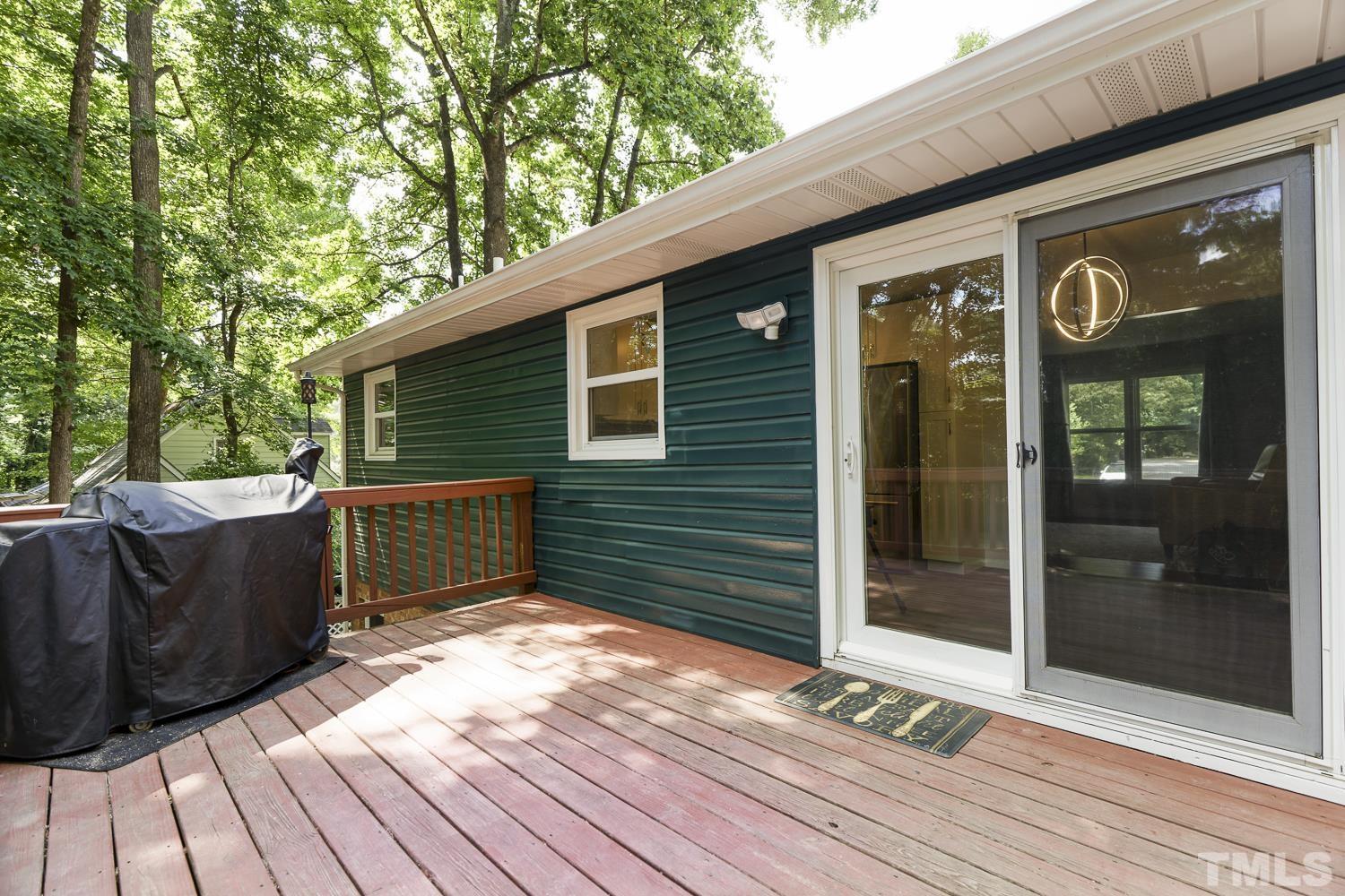 3516 Donna Road Raleigh, NC 27604 - Photo 34 of 41 a view of a house with a door and wooden floor