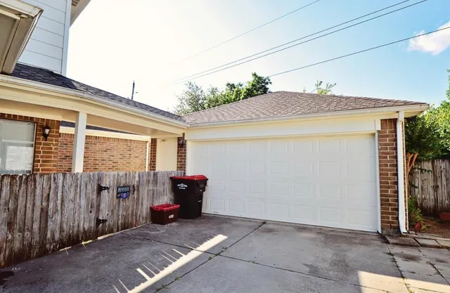 a view of a house with a garage