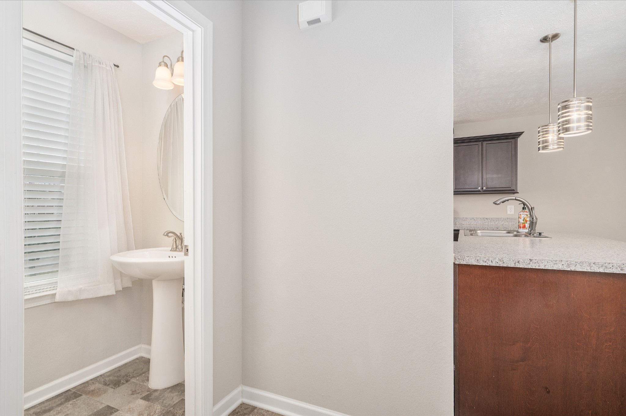 118 Ramsden Avenue La Vergne, TN 37086 - Photo 12 of 24 a bathroom with a granite countertop sink and a mirror
