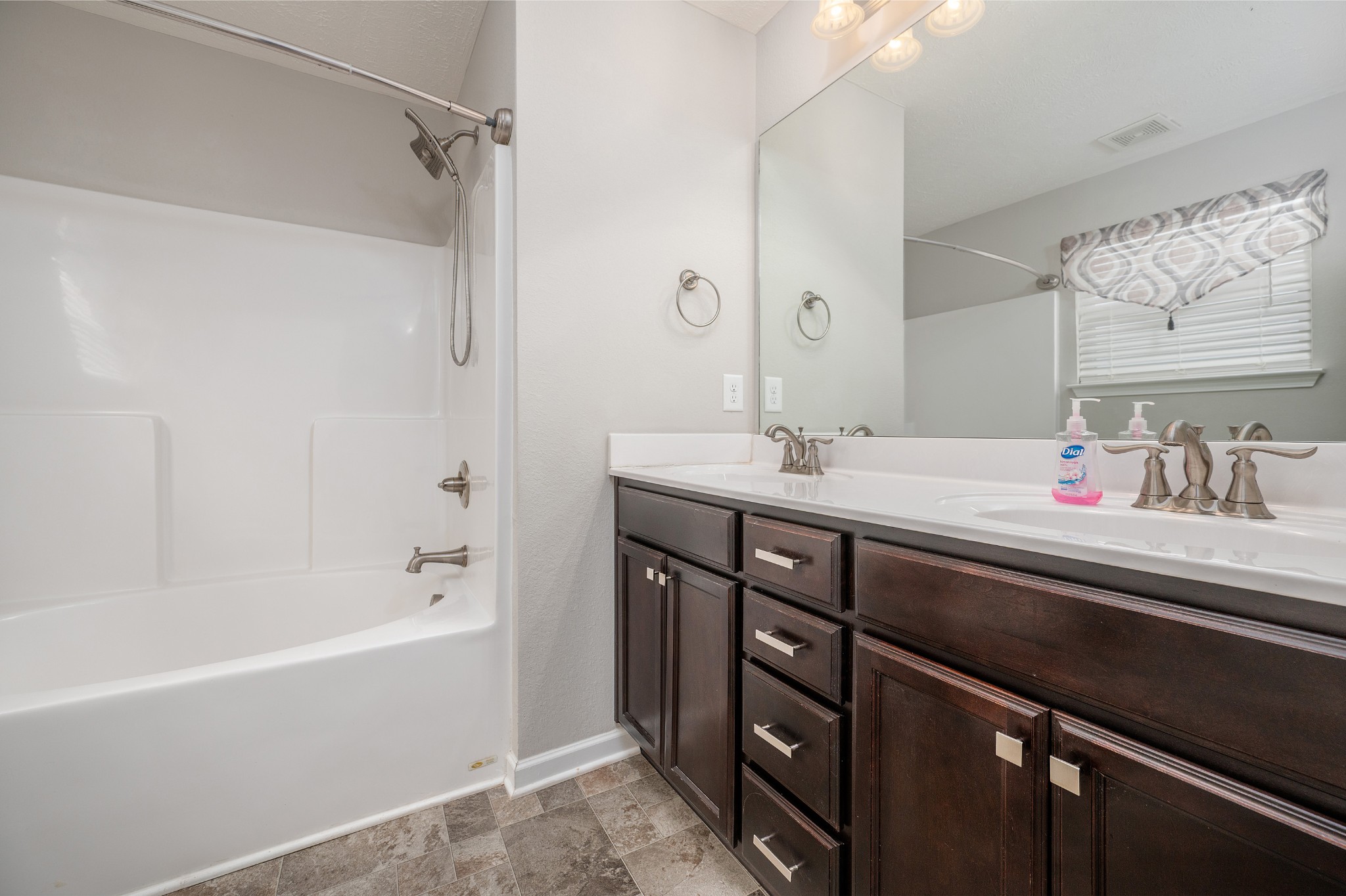 118 Ramsden Avenue La Vergne, TN 37086 - Photo 15 of 24 a bathroom with a tub sink and mirror