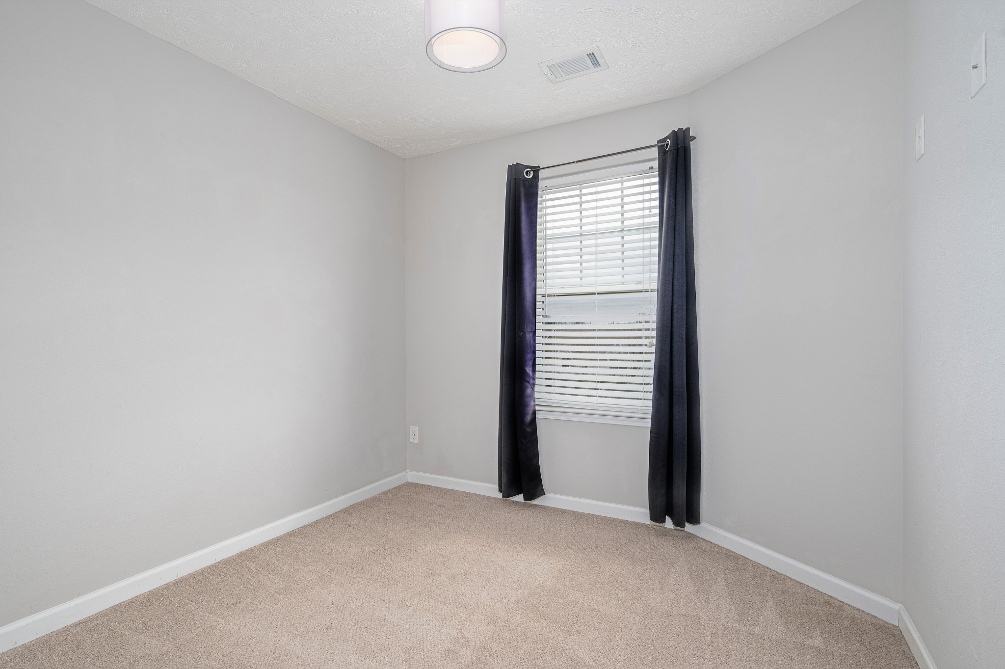 118 Ramsden Avenue La Vergne, TN 37086 - Photo 18 of 24 an empty room with windows