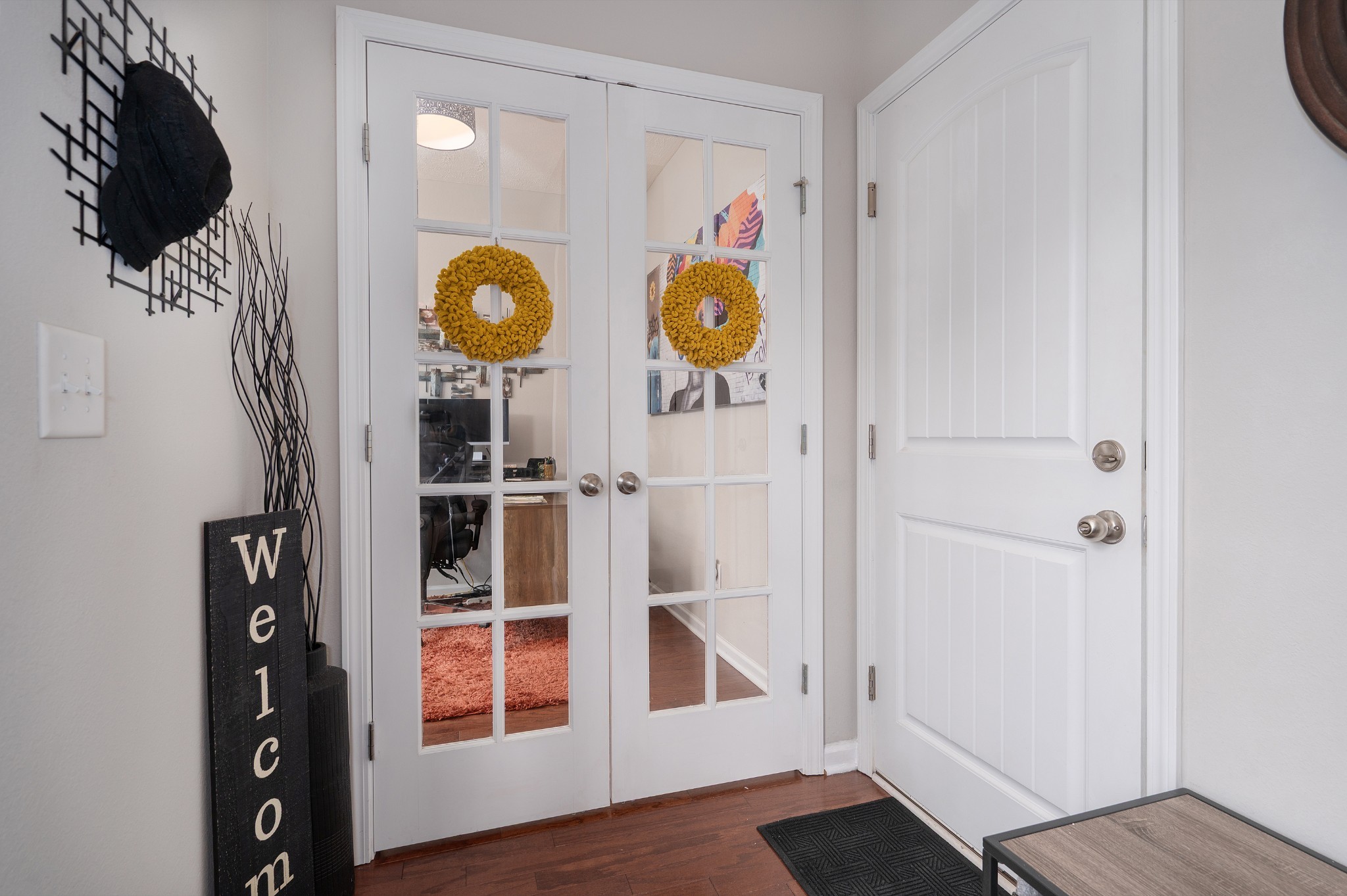 118 Ramsden Avenue La Vergne, TN 37086 - Photo 3 of 33 a view of a hallway with wooden floor and door