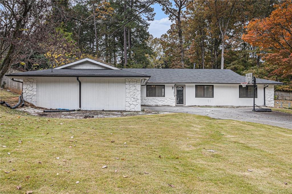 3211 Olde Dekalb Way Atlanta, GA 30340 - Photo 1 of 38 a white house that has a tree in it