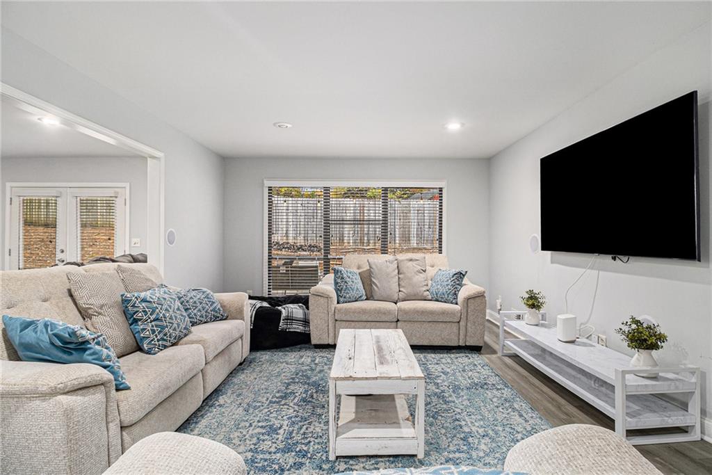 3211 Olde Dekalb Way Atlanta, GA 30340 - Photo 15 of 38 a living room with furniture and a flat screen tv