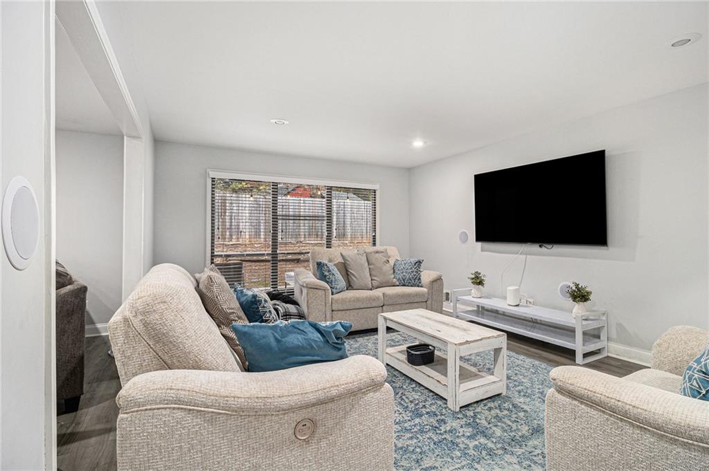 3211 Olde Dekalb Way Atlanta, GA 30340 - Photo 16 of 38 a living room with furniture and a flat screen tv