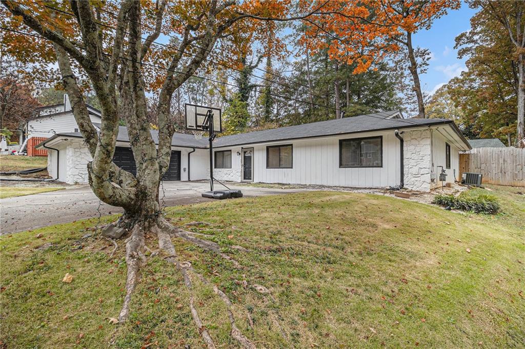 3211 Olde Dekalb Way Atlanta, GA 30340 - Photo 2 of 38 a view of a house with a yard