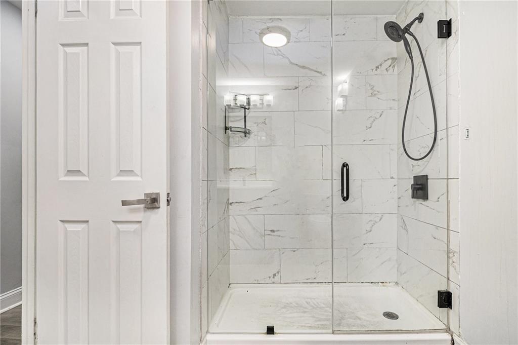 3211 Olde Dekalb Way Atlanta, GA 30340 - Photo 22 of 38 a bathroom with a shower