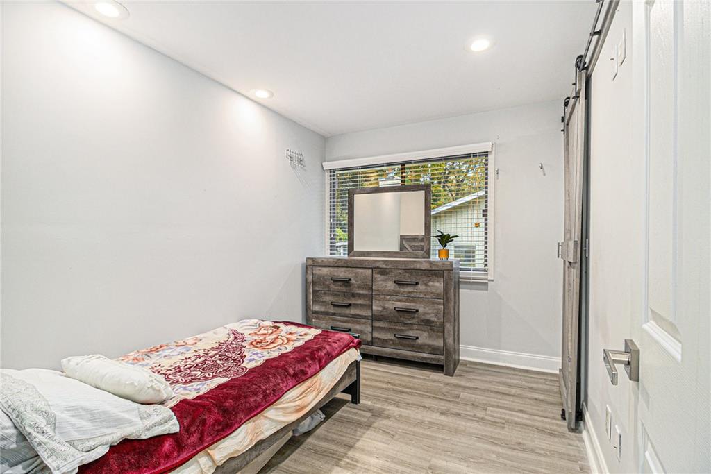 3211 Olde Dekalb Way Atlanta, GA 30340 - Photo 28 of 38 a bedroom with a bed and a dresser