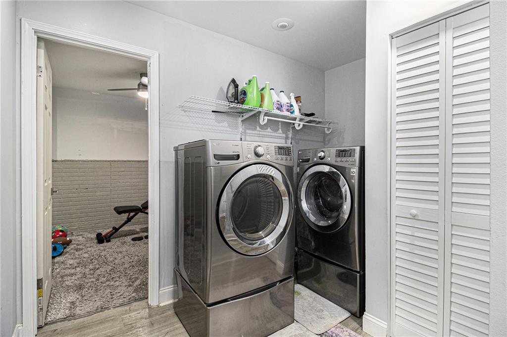 3211 Olde Dekalb Way Atlanta, GA 30340 - Photo 30 of 38 a storage room with washer and dryer
