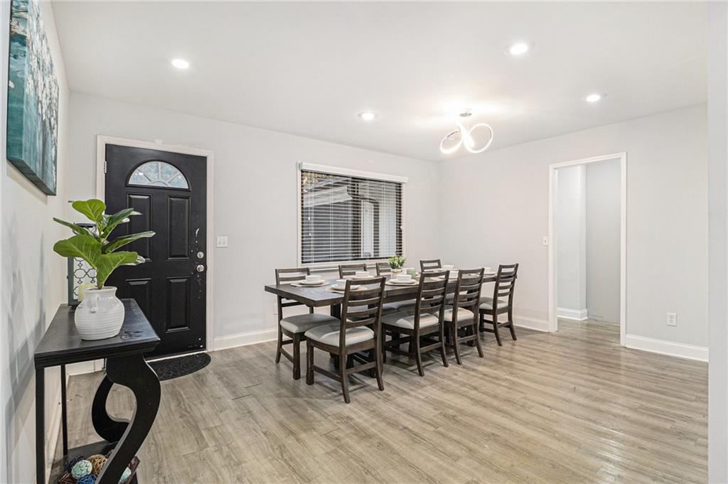 3211 Olde Dekalb Way Atlanta, GA 30340 - Photo 6 of 38 a view of a dining room with furniture and wooden floor