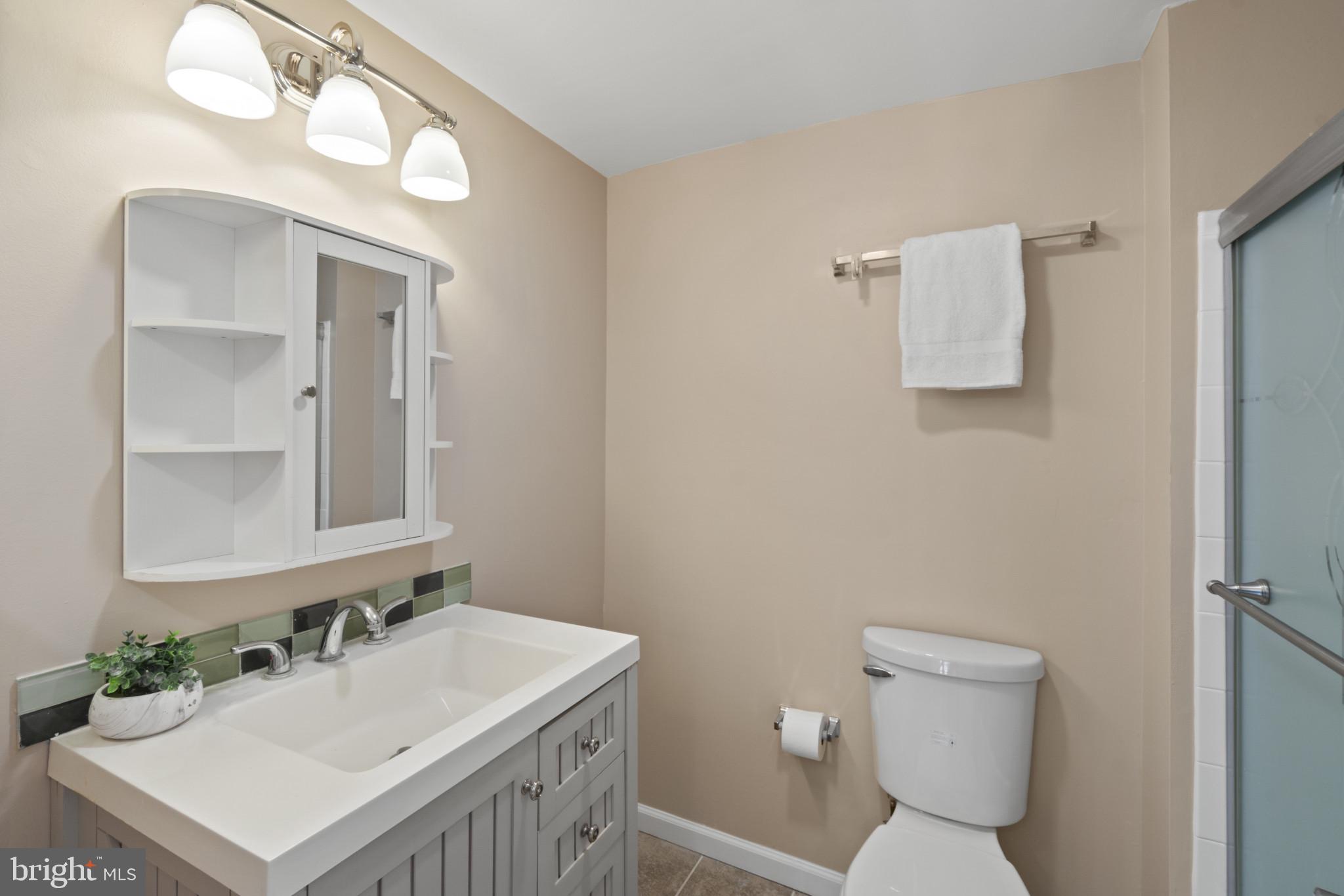 2 Warren Common Cockeysville, MD 21030 - Photo 17 of 26 Full bathroom with vanity and ceramic tile