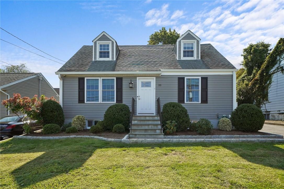 33 Kathwood Road Yonkers, NY 10710 - Photo 1 of 1 a front view of a house with a yard