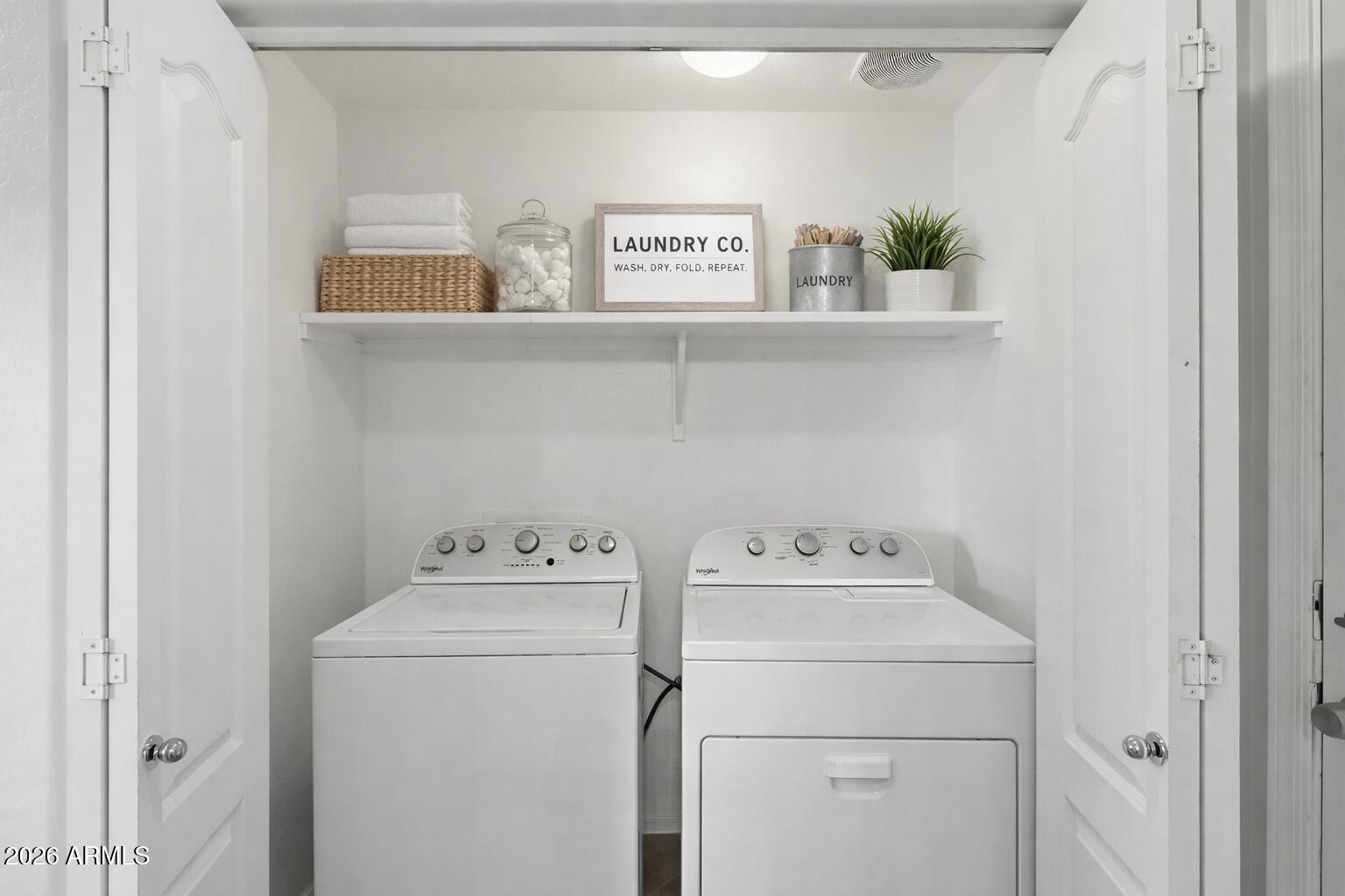 1853 South Balboa Drive Gilbert, AZ 85295 - Photo 16 of 32 a utility room with dryer and washer