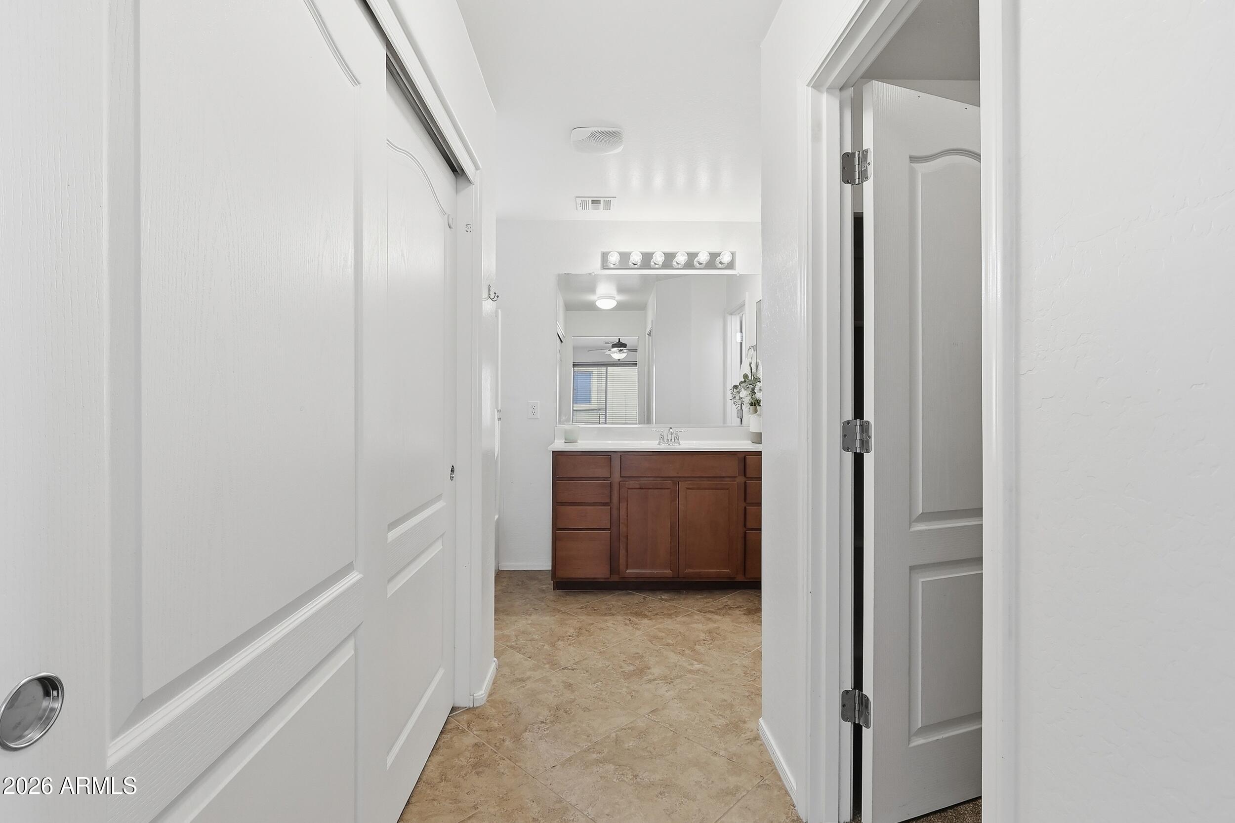 1853 South Balboa Drive Gilbert, AZ 85295 - Photo 19 of 32 a bathroom with a tub and shower
