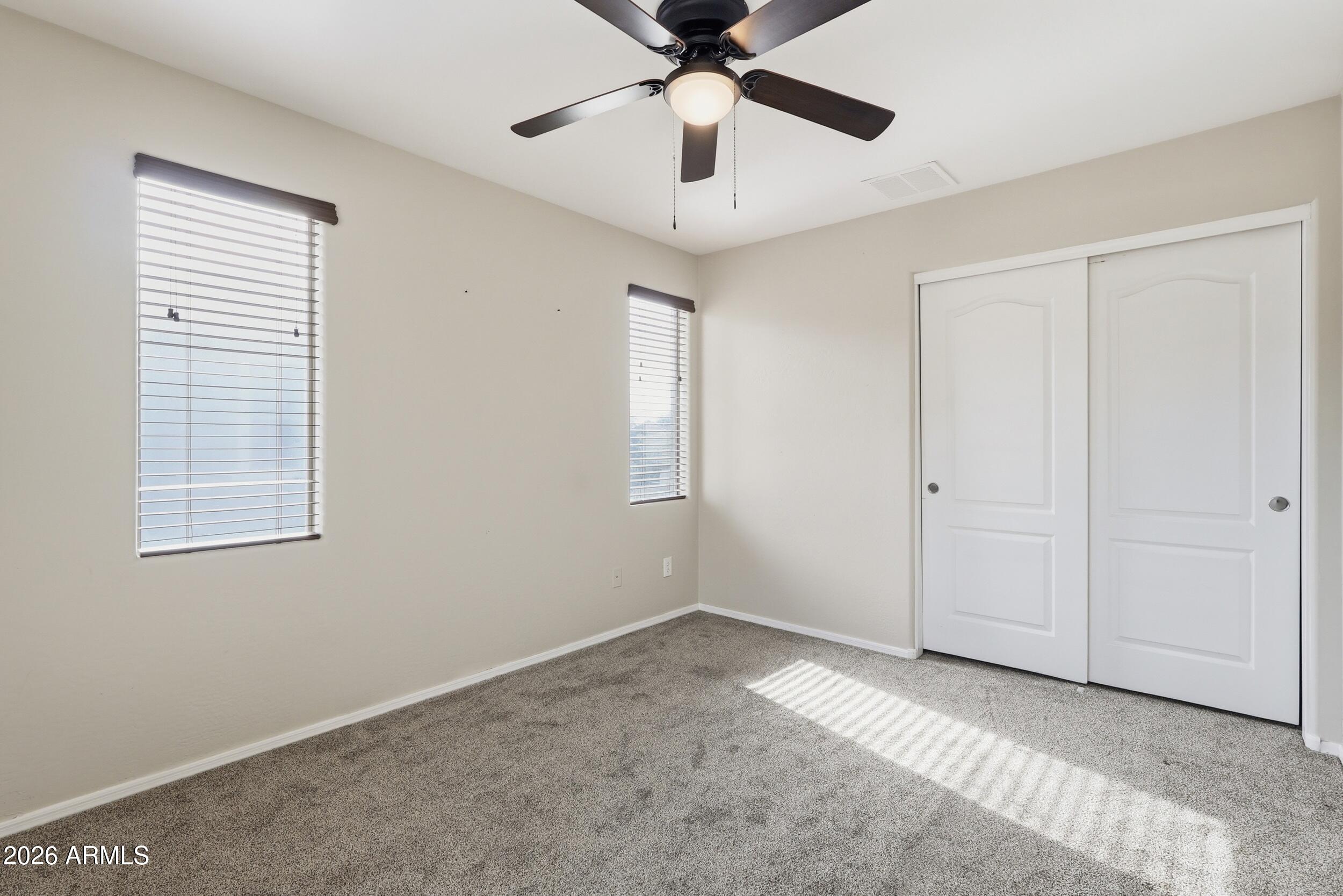 1853 South Balboa Drive Gilbert, AZ 85295 - Photo 23 of 32 a view of an empty room with a window