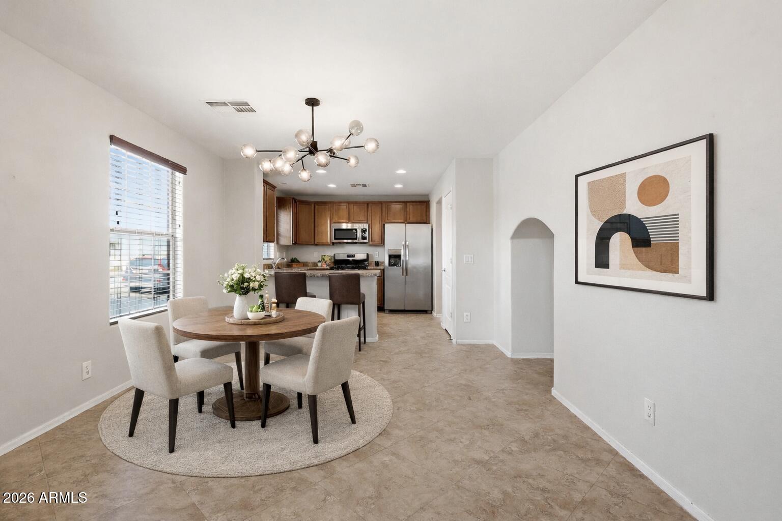 1853 South Balboa Drive Gilbert, AZ 85295 - Photo 8 of 32 a view of a dining room with furniture