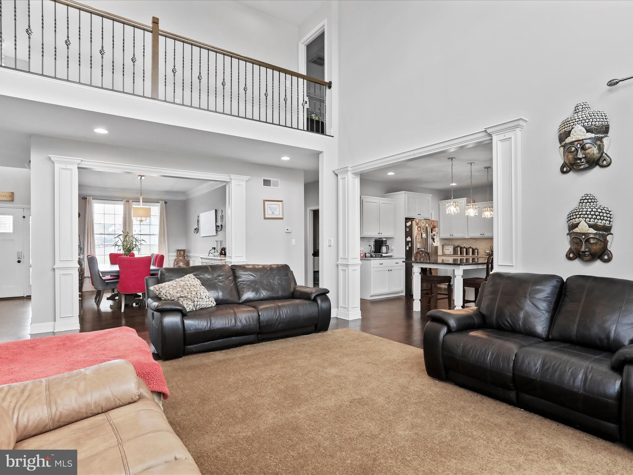 1699 Wind Flower Road, Unit 59 Chambersburg, PA 17202 - Photo 27 of 27 a living room with furniture and a couch