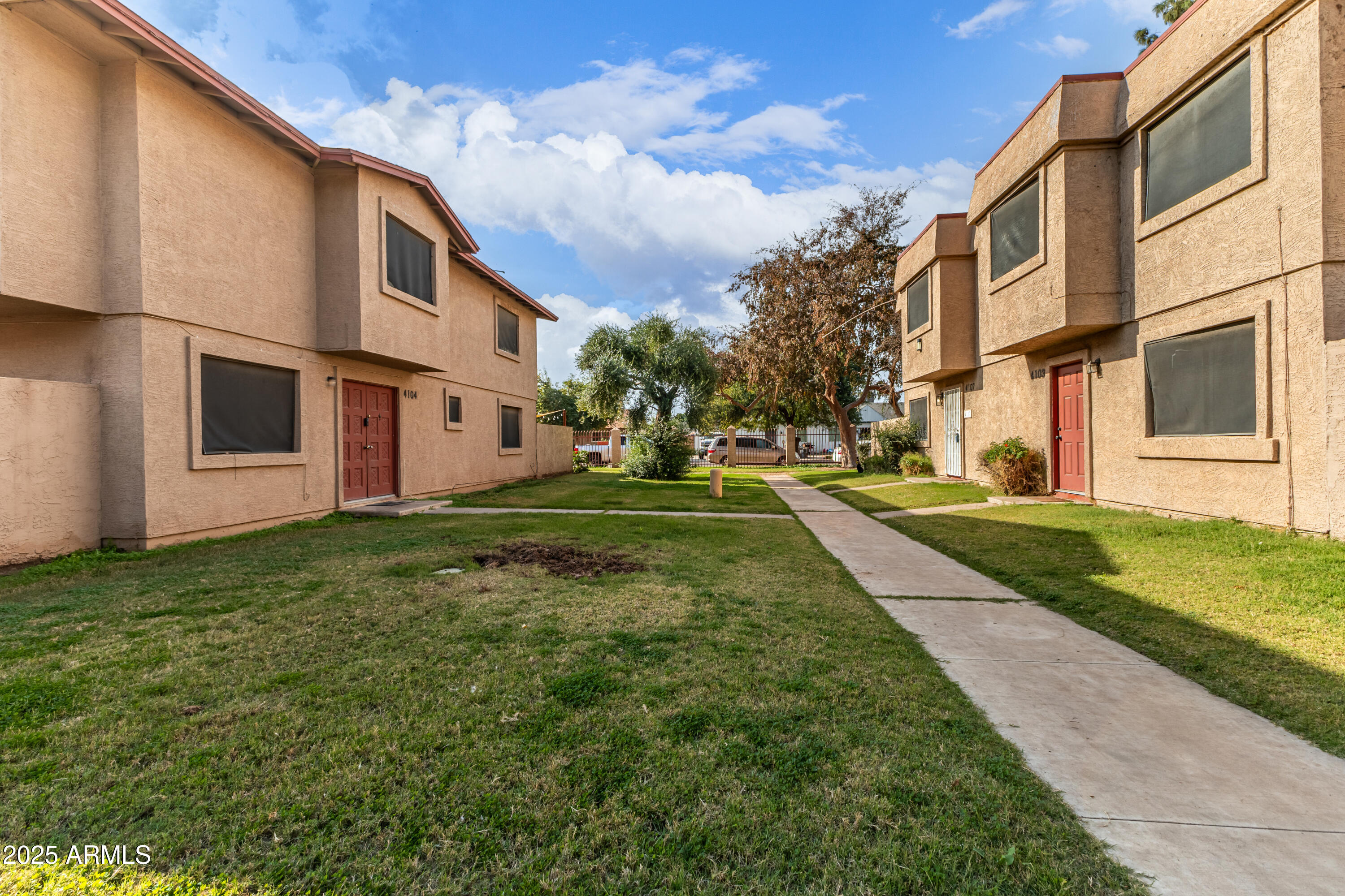 4107 West Wonderview Road Phoenix, AZ 85019 - Photo 11 of 13 a view of a back yard of the house