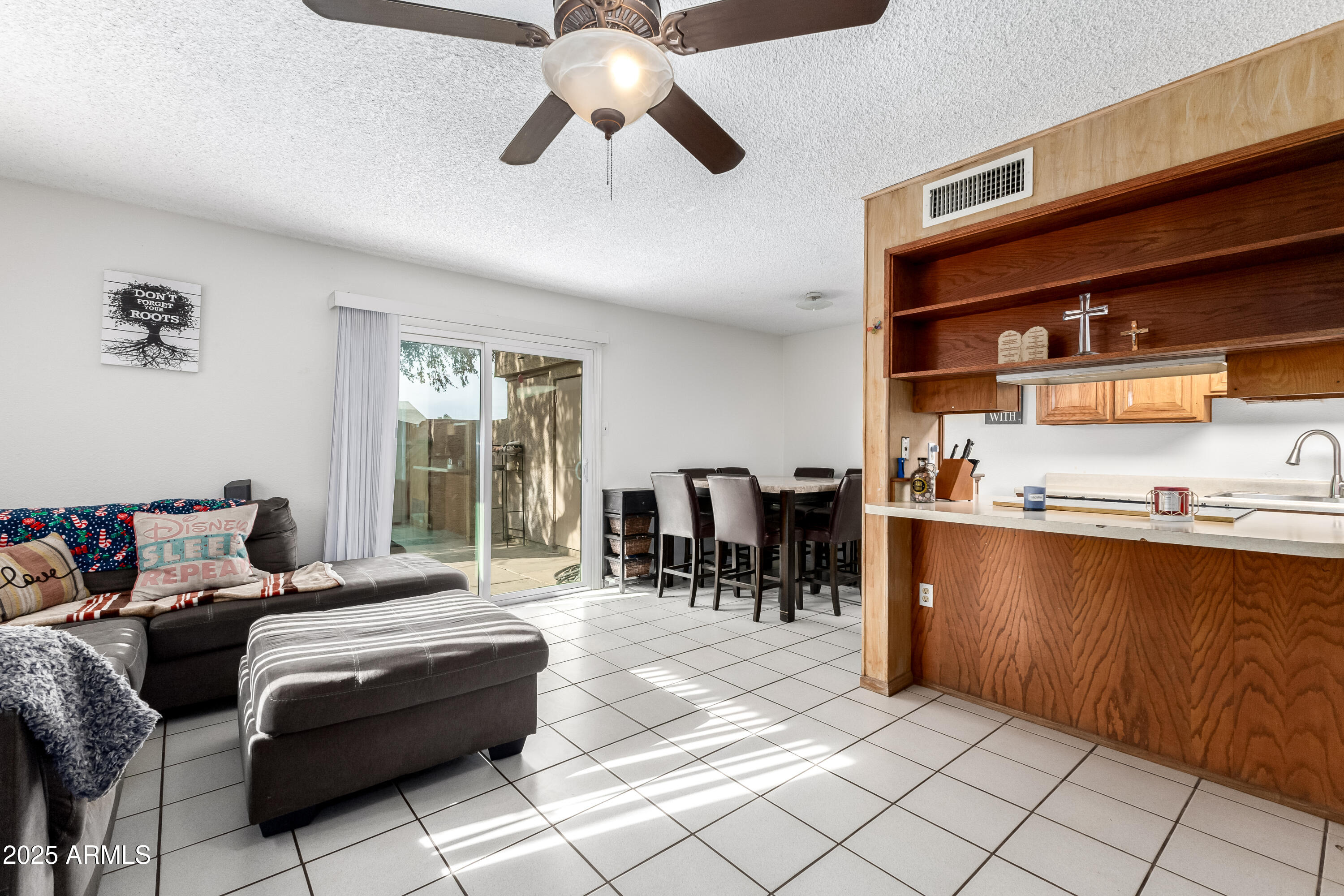 4107 West Wonderview Road Phoenix, AZ 85019 - Photo 3 of 13 a living room with furniture