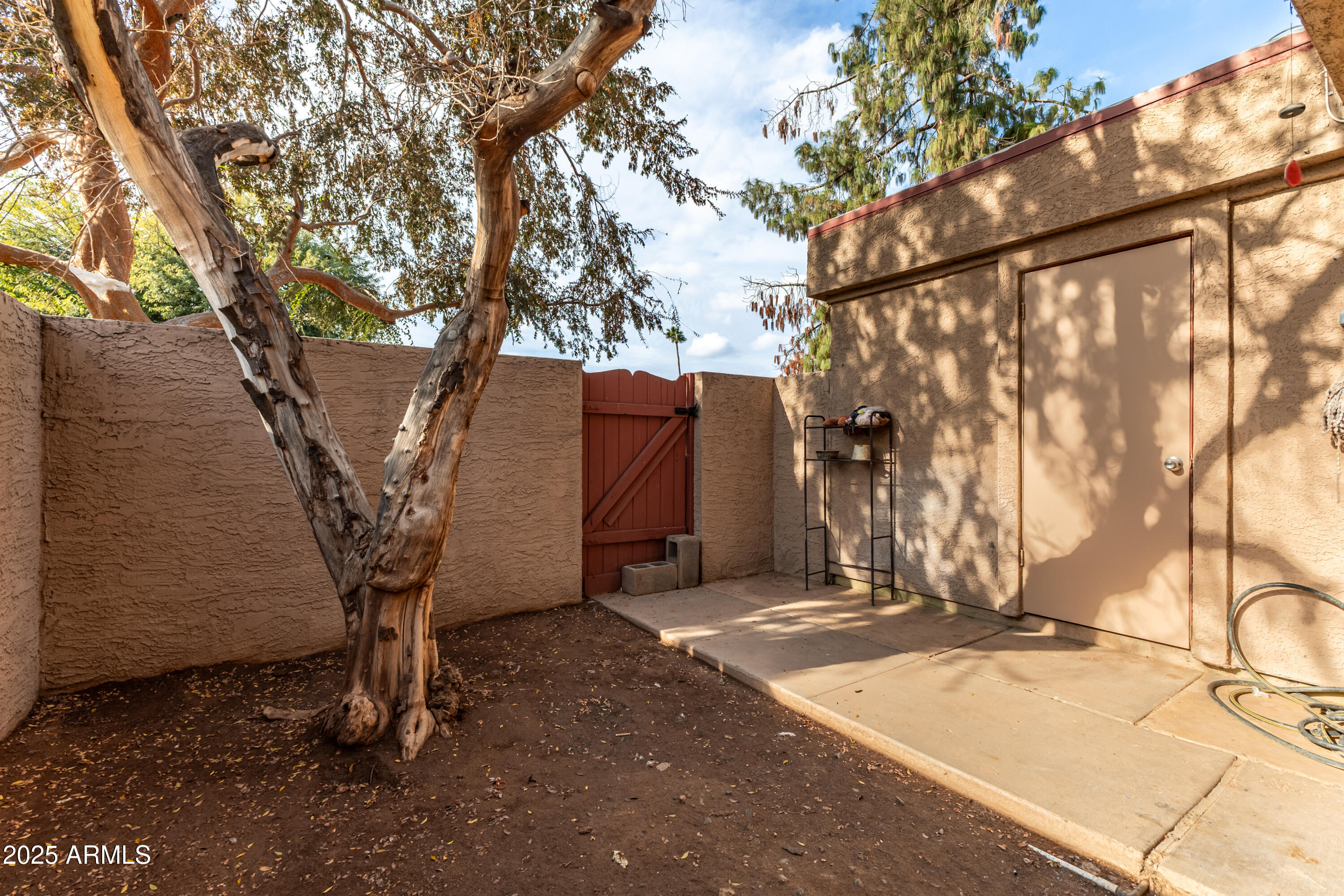 4107 West Wonderview Road Phoenix, AZ 85019 - Photo 10 of 13 a view of a backyard of the house