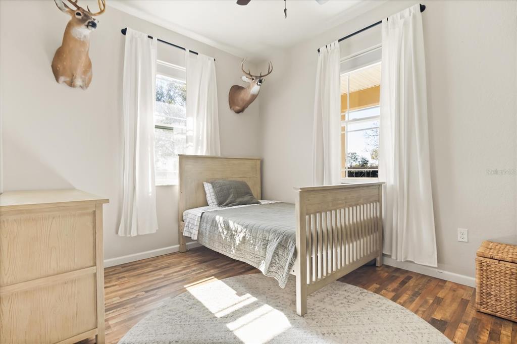 3865 Rabbit Run Road Wauchula, FL 33873 - Photo 21 of 43 a bedroom with a bed and a window