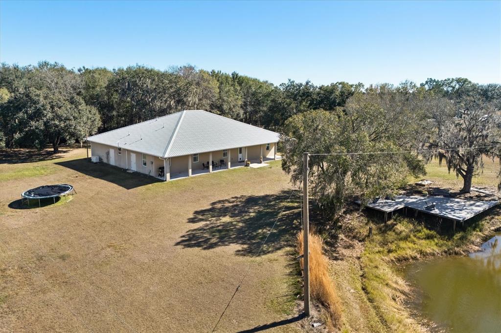 3865 Rabbit Run Road Wauchula, FL 33873 - Photo 37 of 43 a view of a house with yard and lake view
