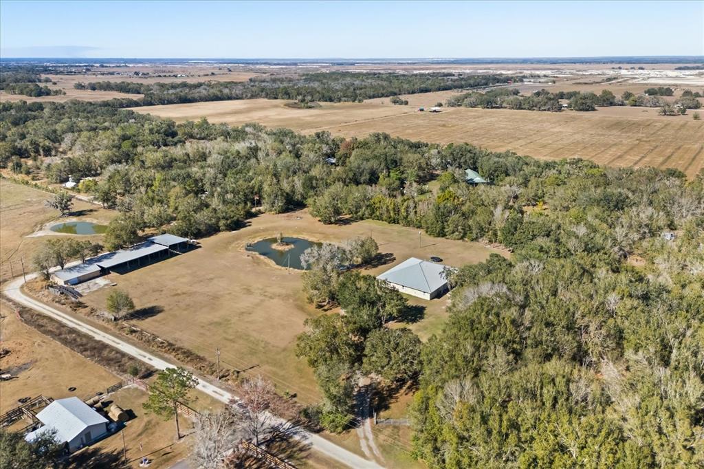 3865 Rabbit Run Road Wauchula, FL 33873 - Photo 38 of 43 a view of a lake with a beach