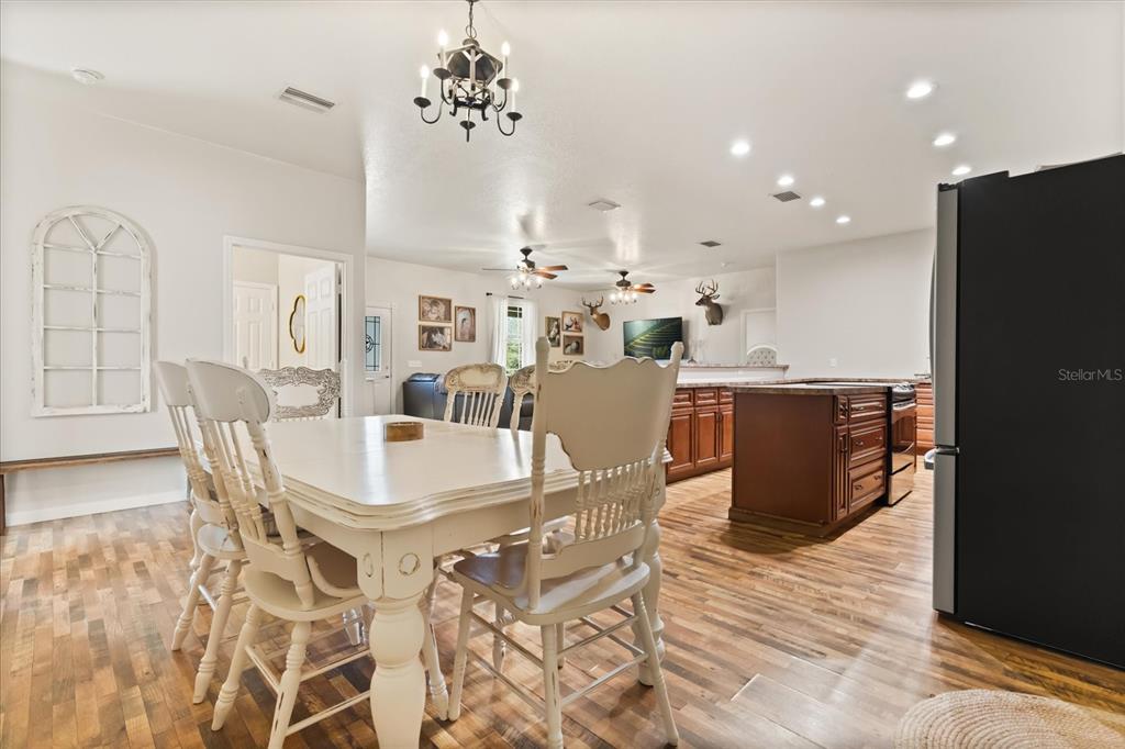 3865 Rabbit Run Road Wauchula, FL 33873 - Photo 7 of 43 a view of a dining room with furniture