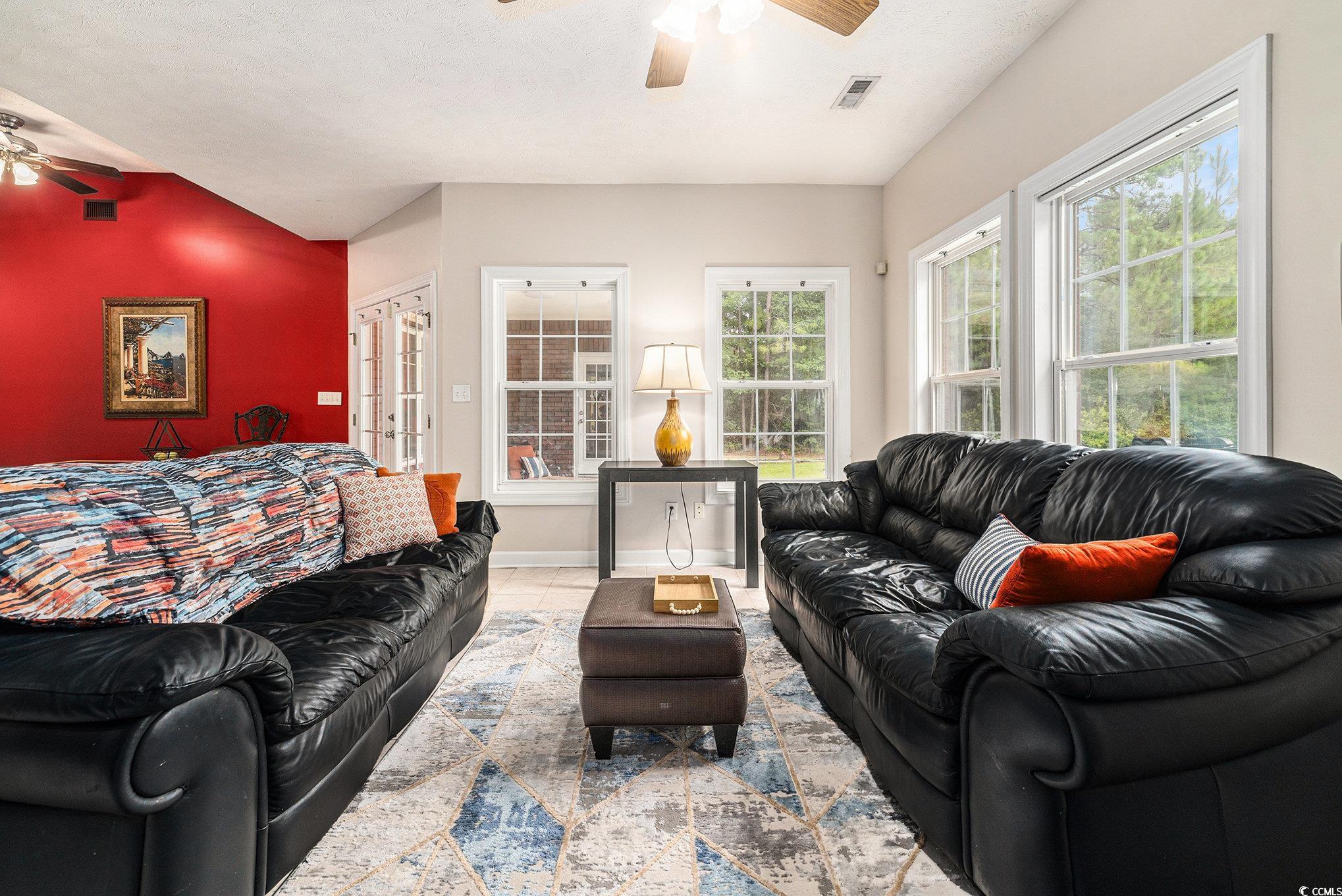 2425 Hunters Trail Myrtle Beach, SC 29588 - Photo 7 of 40 Living area featuring ceiling fan and tile patterned flooring