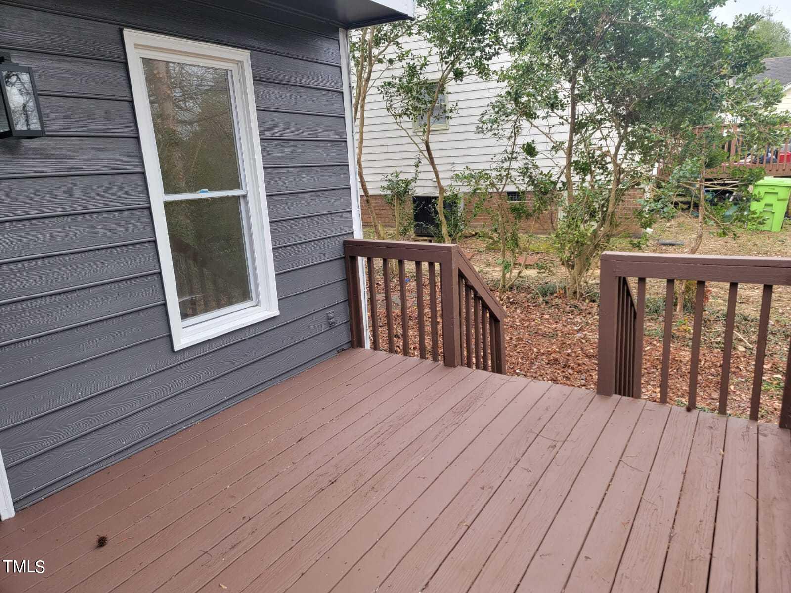 4008 Old Coach Road Raleigh, NC 27616 - Photo 48 of 48 a balcony with wooden floor