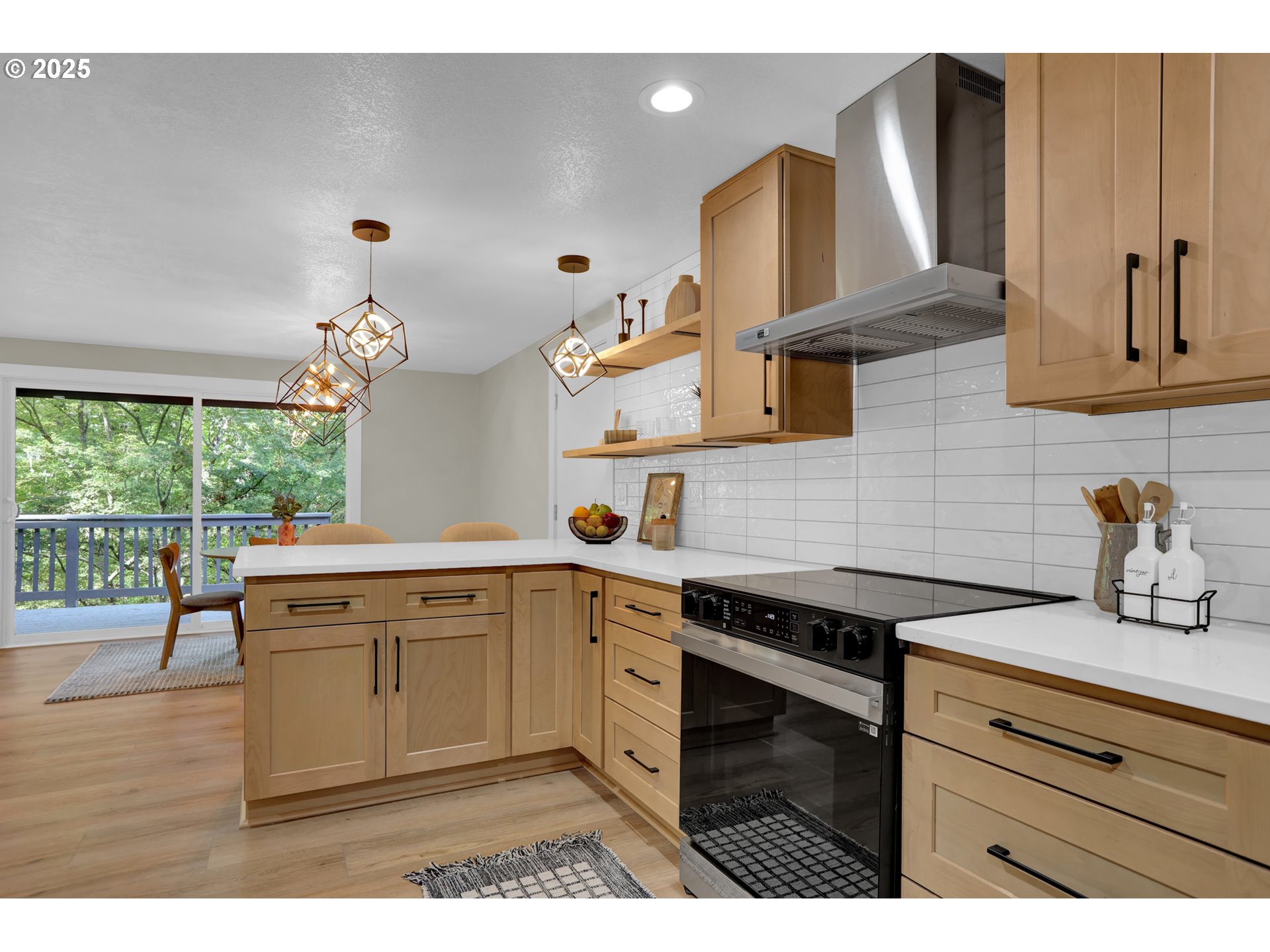 315 Brookside Drive Eugene, OR 97405 - Photo 12 of 46 a kitchen with a sink cabinets and wooden floor
