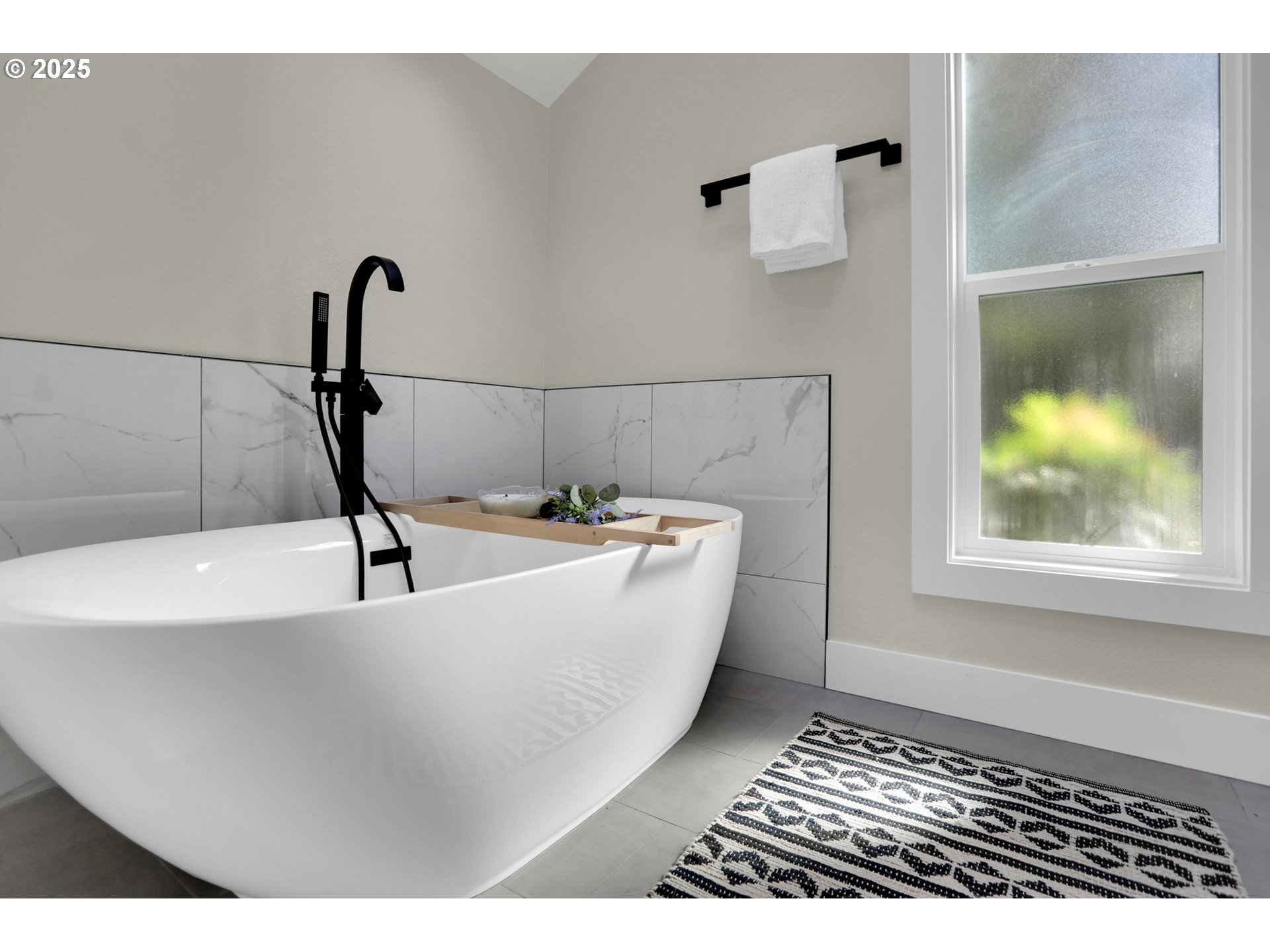315 Brookside Drive Eugene, OR 97405 - Photo 24 of 46 a view of a bathtub in a bathroom
