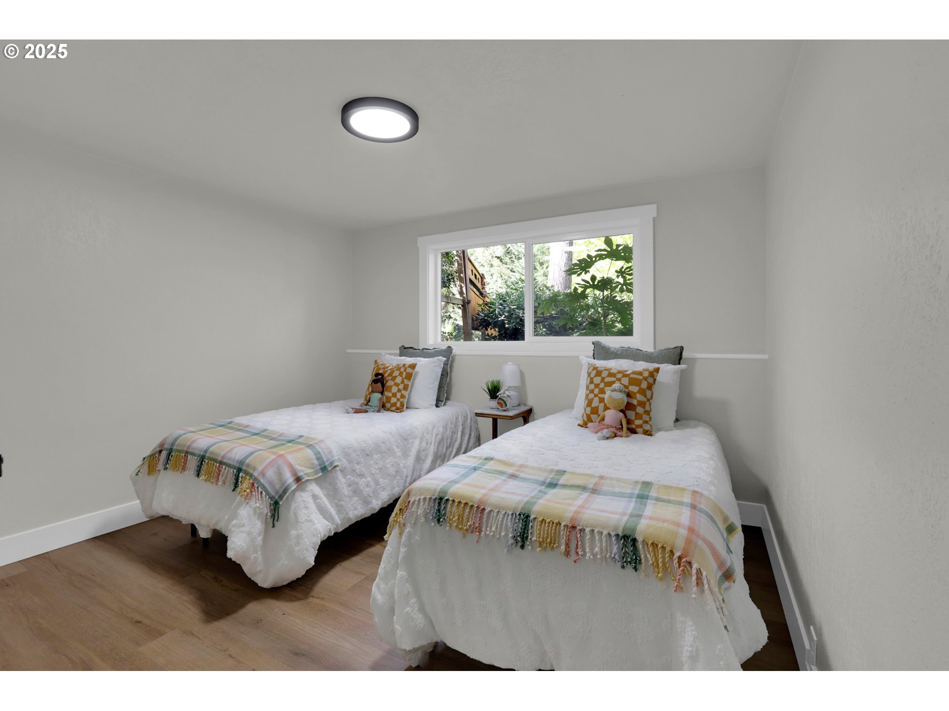 315 Brookside Drive Eugene, OR 97405 - Photo 30 of 46 a bedroom with two beds and a large window