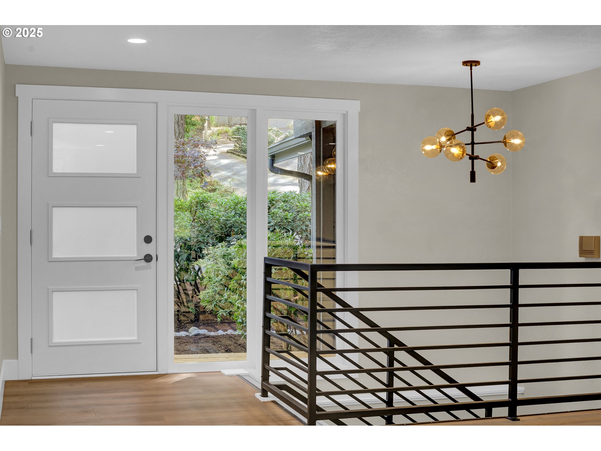 315 Brookside Drive Eugene, OR 97405 - Photo 3 of 46 a view of wooden floor and windows in a room