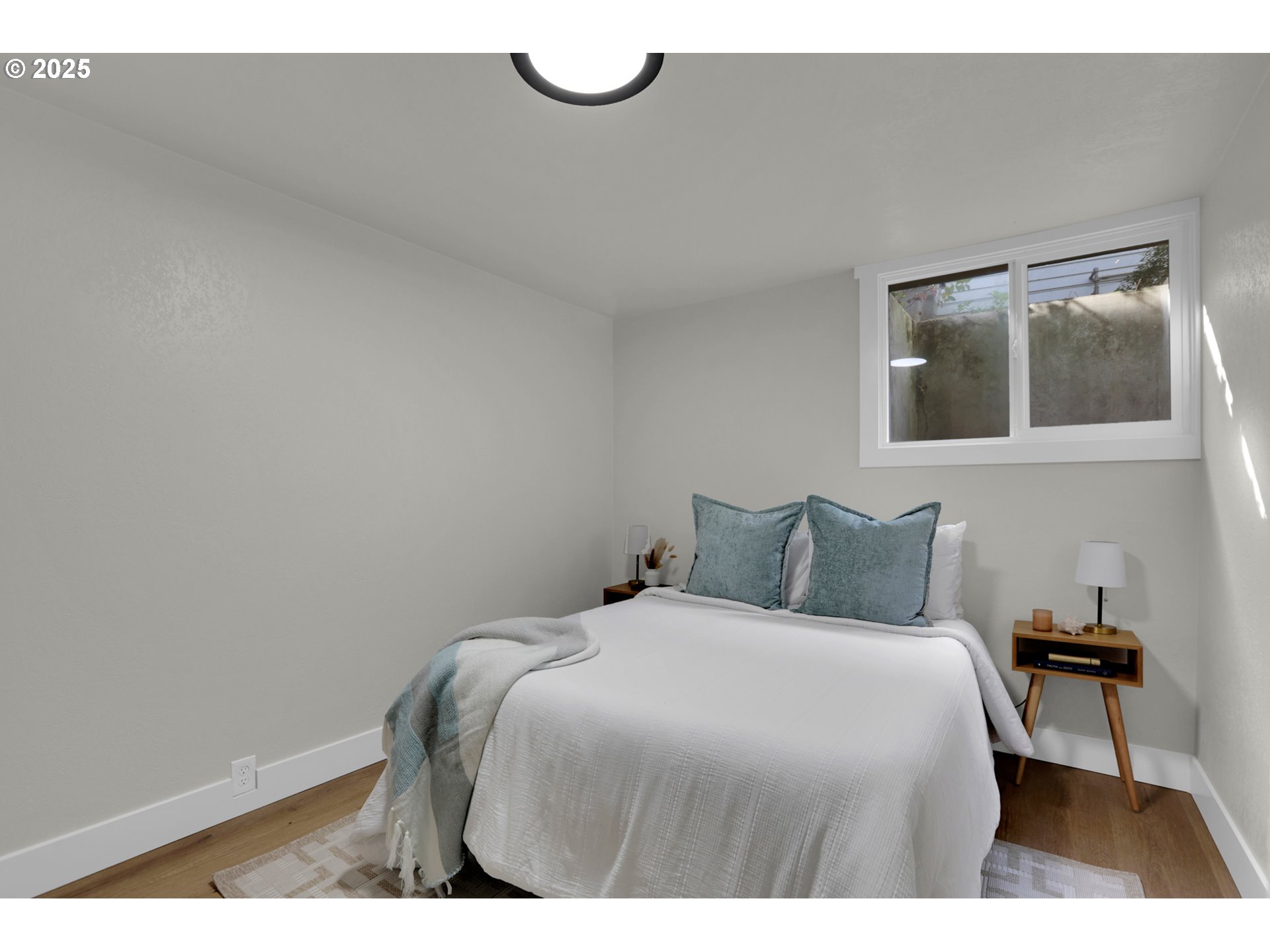 315 Brookside Drive Eugene, OR 97405 - Photo 31 of 46 a bedroom with a bed and night stand