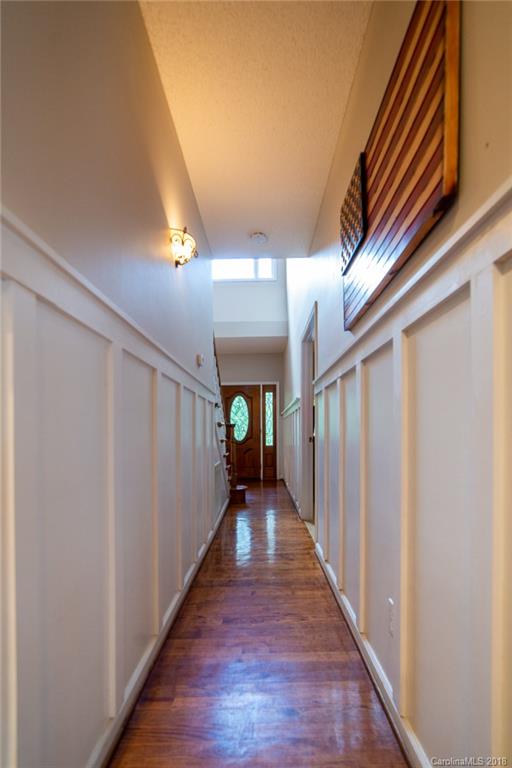 4225 Rowell Road Lancaster, SC 29720 - Photo 15 of 34 a view of a hallway with wooden floor and staircase