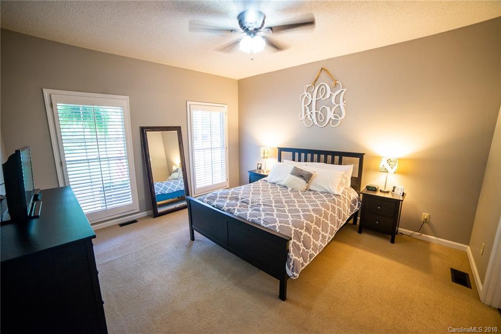 4225 Rowell Road Lancaster, SC 29720 - Photo 16 of 34 a bed sitting in a bedroom next to a window