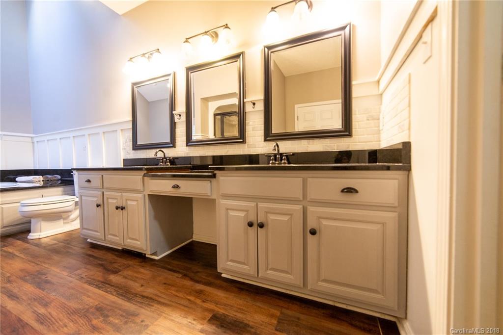 4225 Rowell Road Lancaster, SC 29720 - Photo 18 of 34 a kitchen with white cabinets and sink