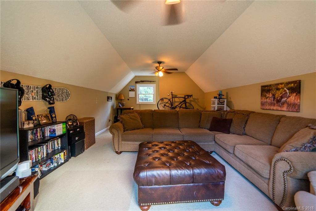 4225 Rowell Road Lancaster, SC 29720 - Photo 28 of 34 a living room with furniture and a couch