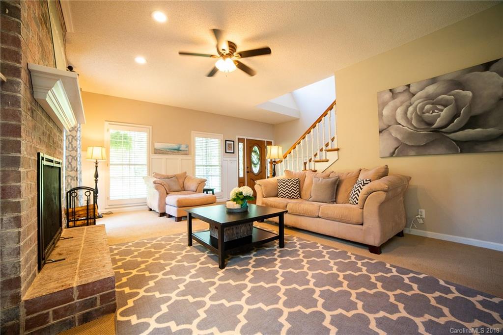 4225 Rowell Road Lancaster, SC 29720 - Photo 4 of 34 a living room with furniture and a rug