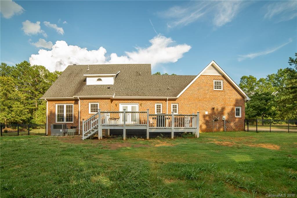 4225 Rowell Road Lancaster, SC 29720 - Photo 32 of 34 a view of a house with a backyard