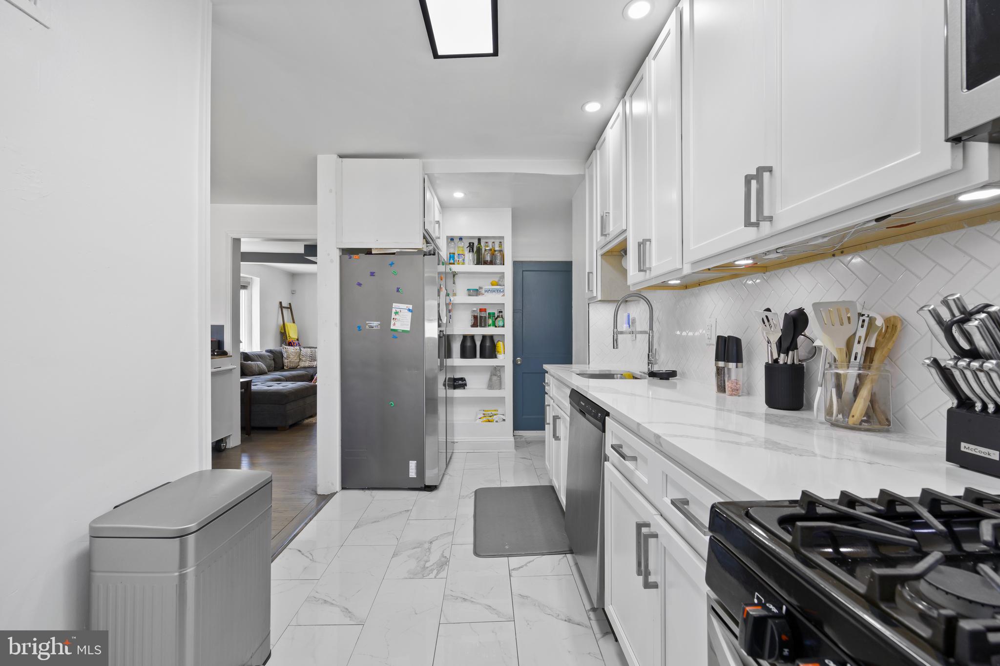 4511 Marble Hall Road Baltimore, MD 21239 - Photo 18 of 48 a kitchen with stainless steel appliances granite countertop a refrigerator and a stove