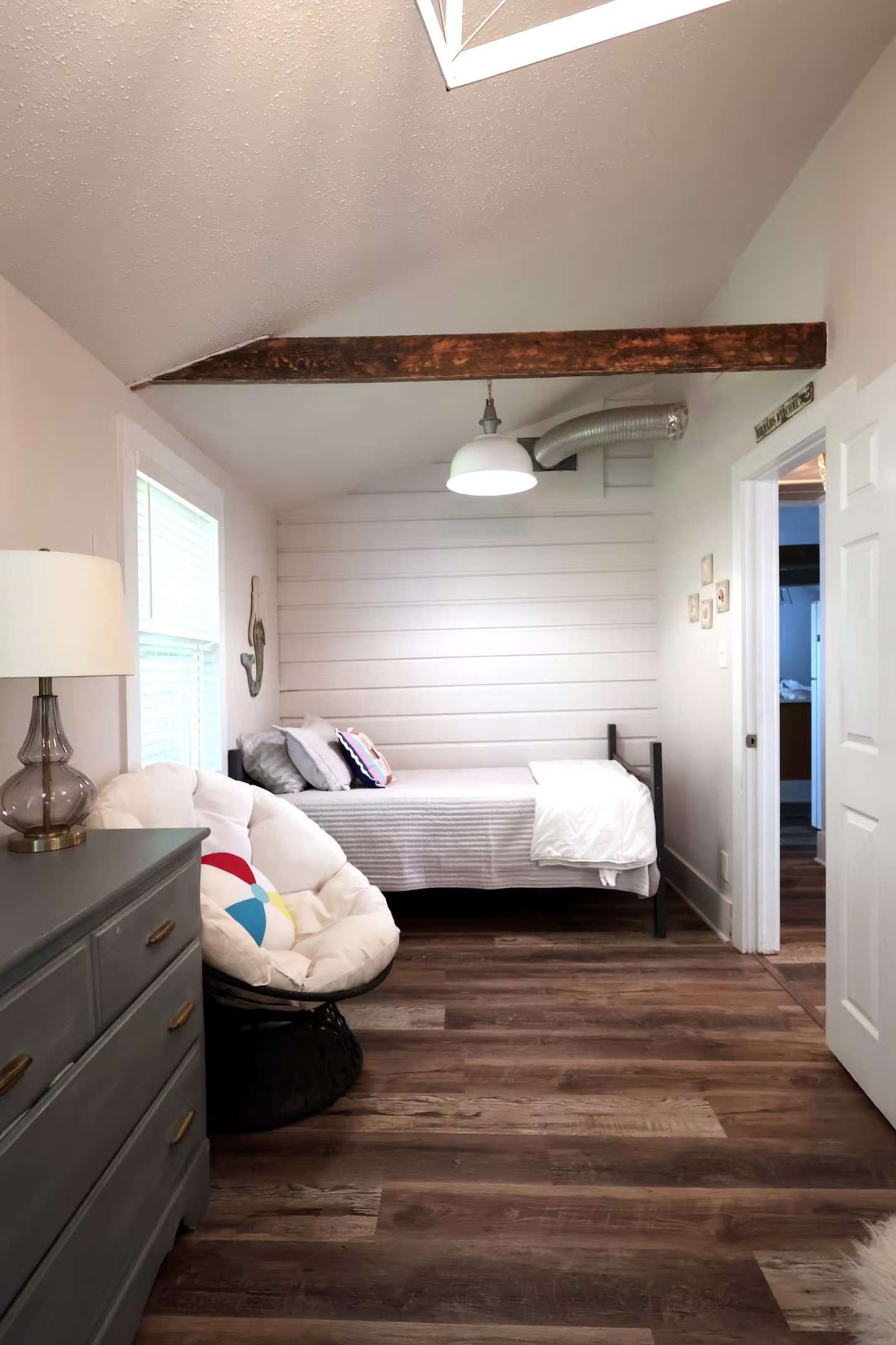 310 Shark Lane Surfside Beach, TX 77541 - Photo 11 of 33 a bedroom with bed and window